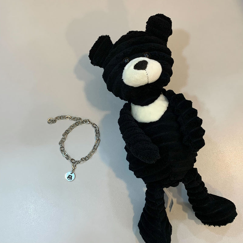 Corduroy plush bear and Moonie bracelet bundle