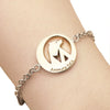 Round charm with silver chain bracelet